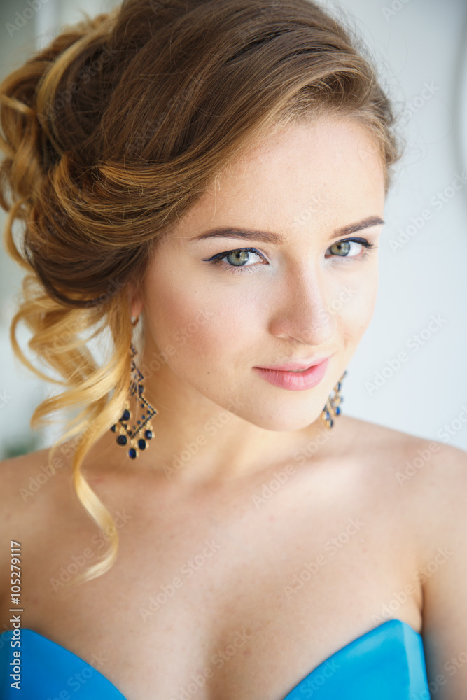 Beautiful bride in gorgeous blue dress Cinderella style in a morning. Close up beauty portrait Beautiful bride in gorgeous blue dress Cinderella style in a morning. Close up beauty portrait