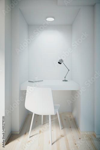 Small white office with blank front wall © peshkova