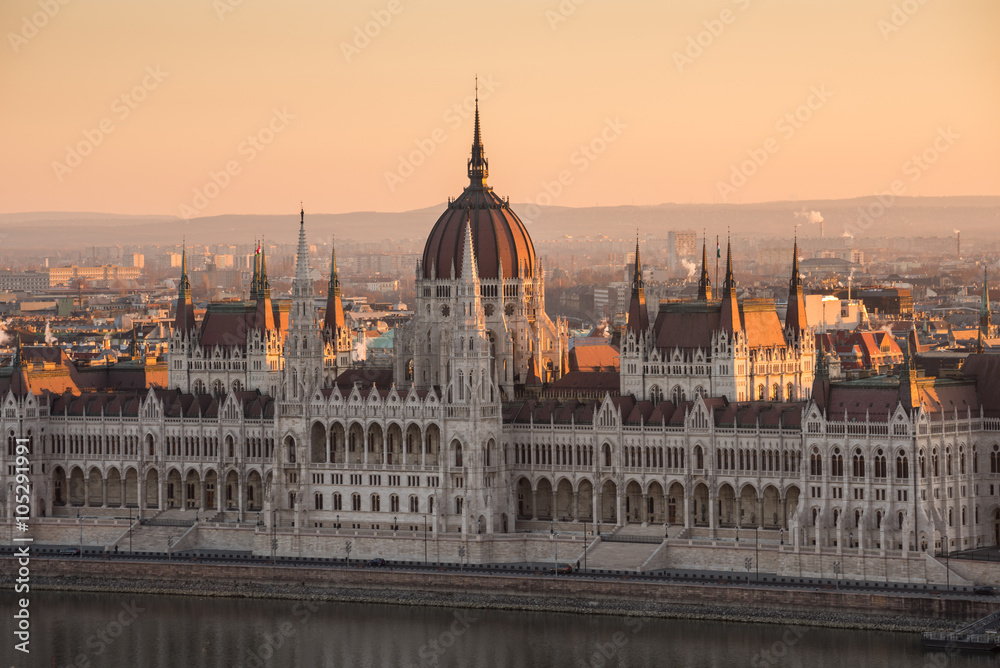 Illuminated Hungarian Parliament Building in Budapest, Hungary at Sunrise