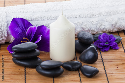 Spa concept  zen stones  candles and flowers