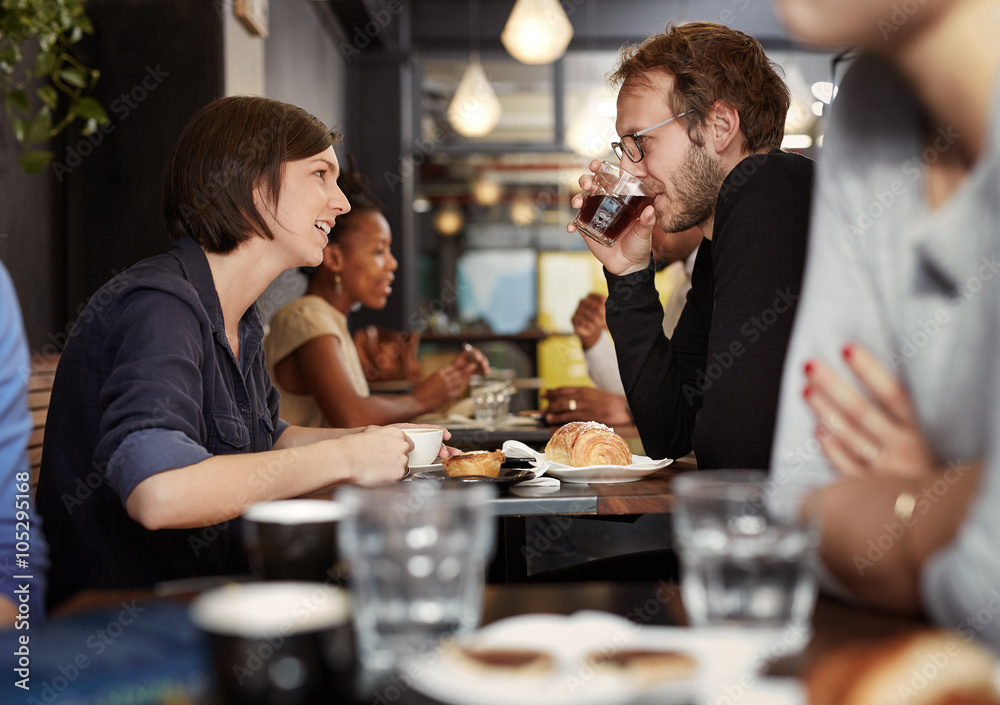 Woman talking to her boyfriend on a coffee date Woman talking to her boyfriend on a coffee date
