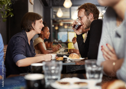 Woman talking to her boyfriend on a coffee date