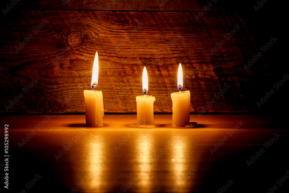 Background with candles light on wood Background with candles light on wood
