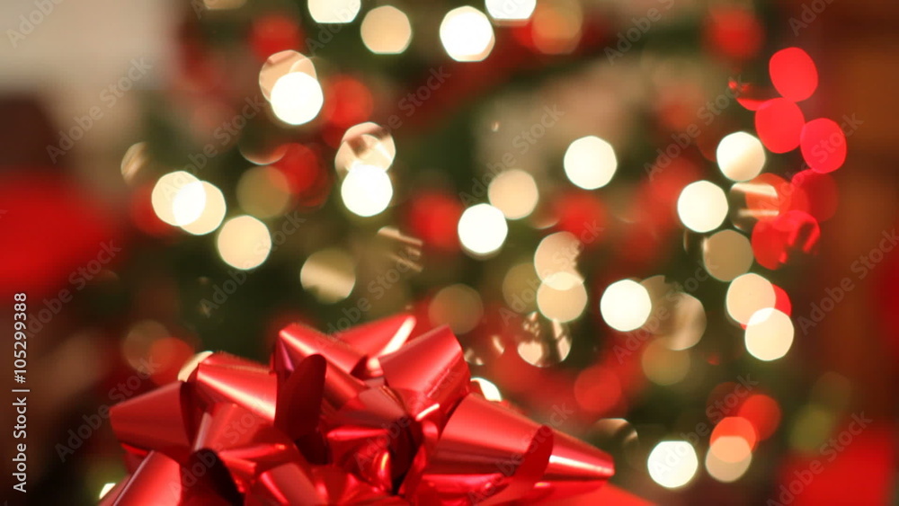 Christmas present in front of tree, jib down