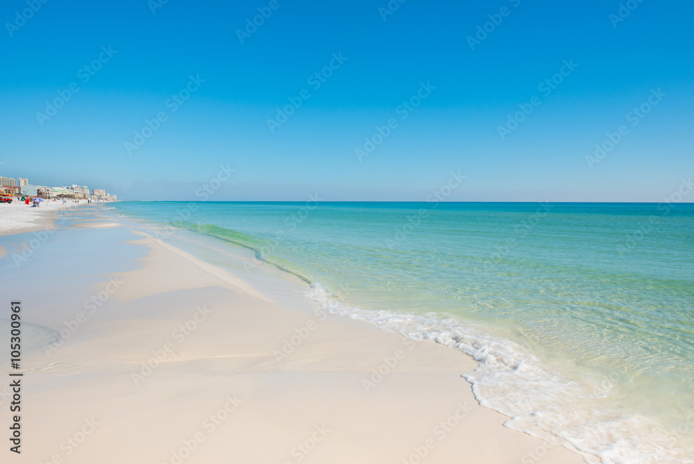 sunny day white sand beach with blue sky and blue green water sunny day white sand beach with blue sky and blue green water