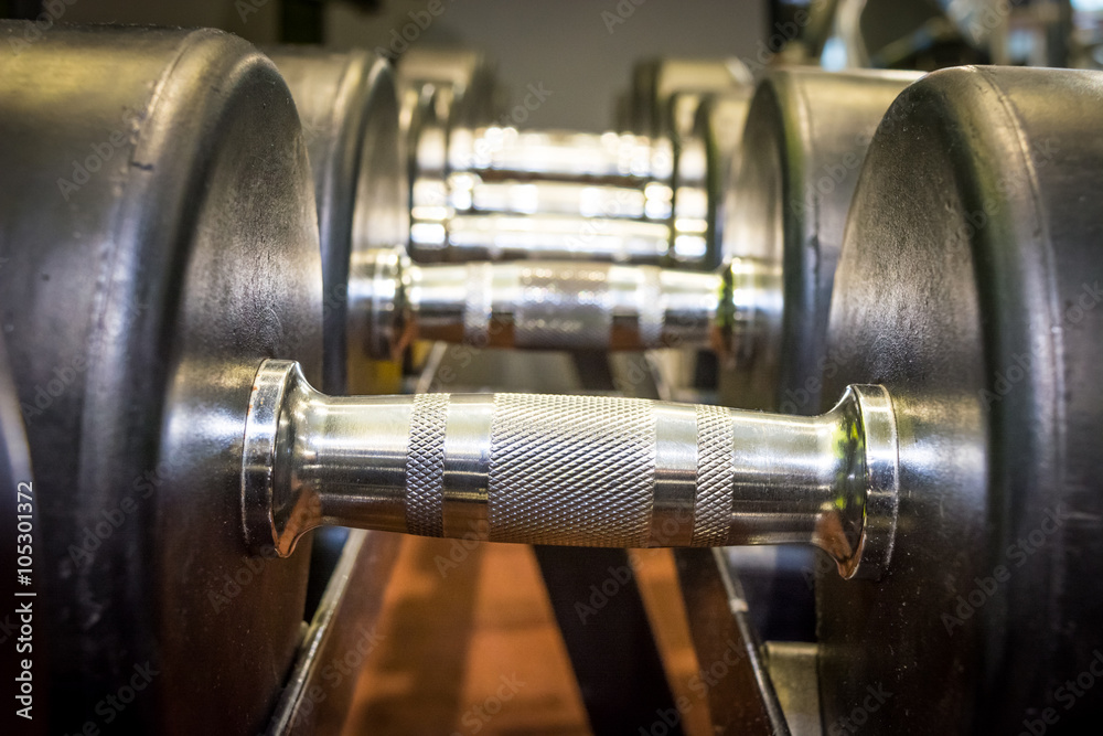 Dumbbells in the row at the gym