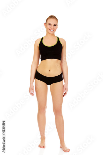 Athletic young woman in sports underwear