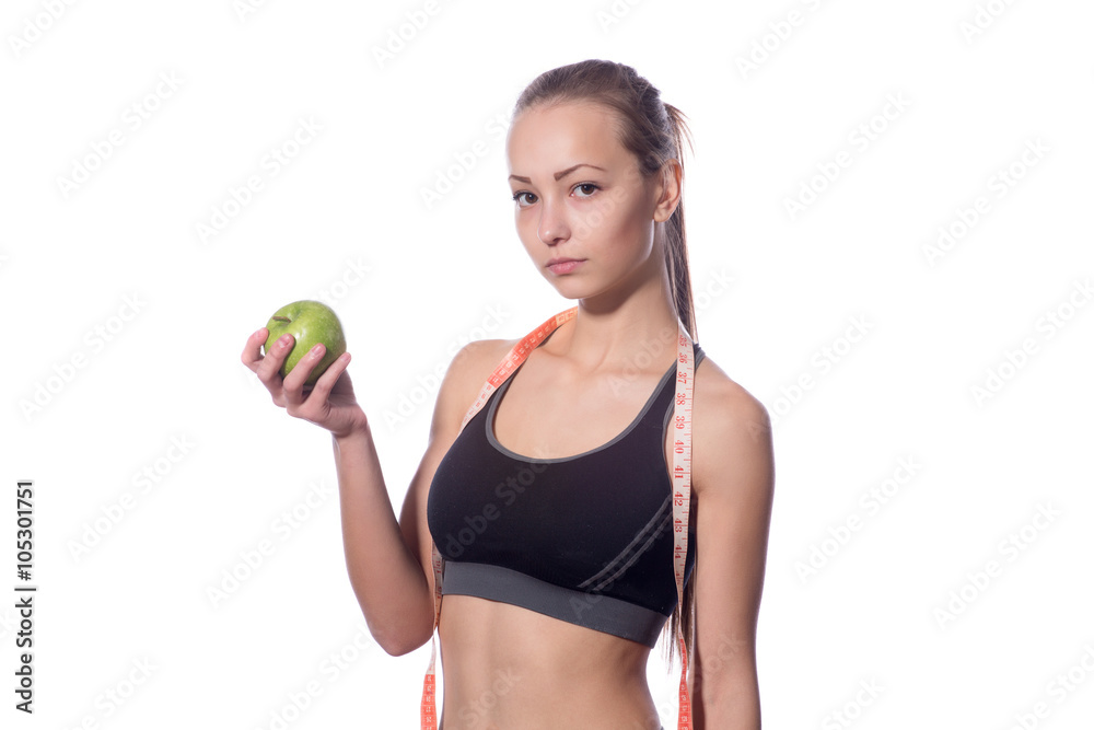 attractive fitness model with measuring tape on a white background attractive fitness model with measuring tape on a white background