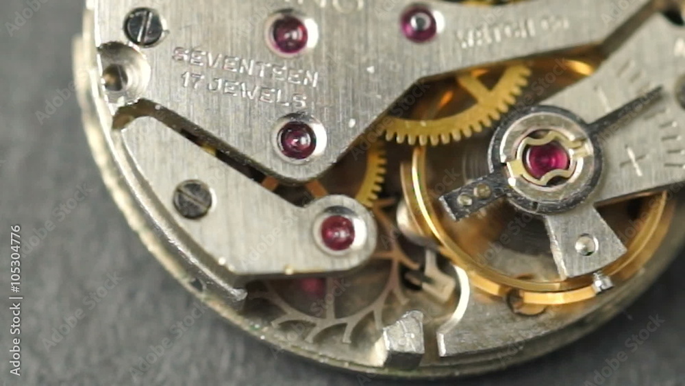 A watch movement still running outside of it's case A watch movement still running outside of it's case