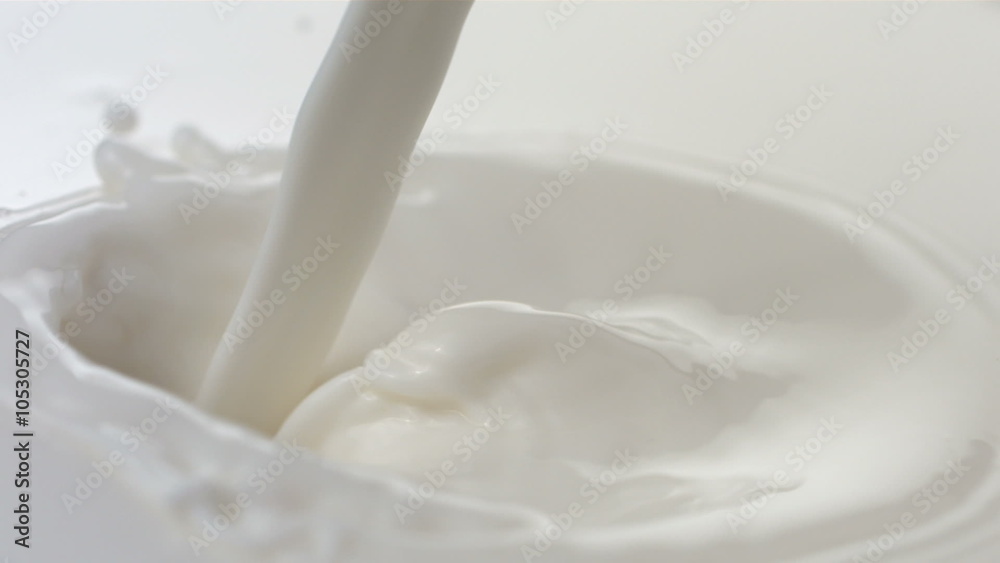 Pouring milk, slow motion Pouring milk, slow motion