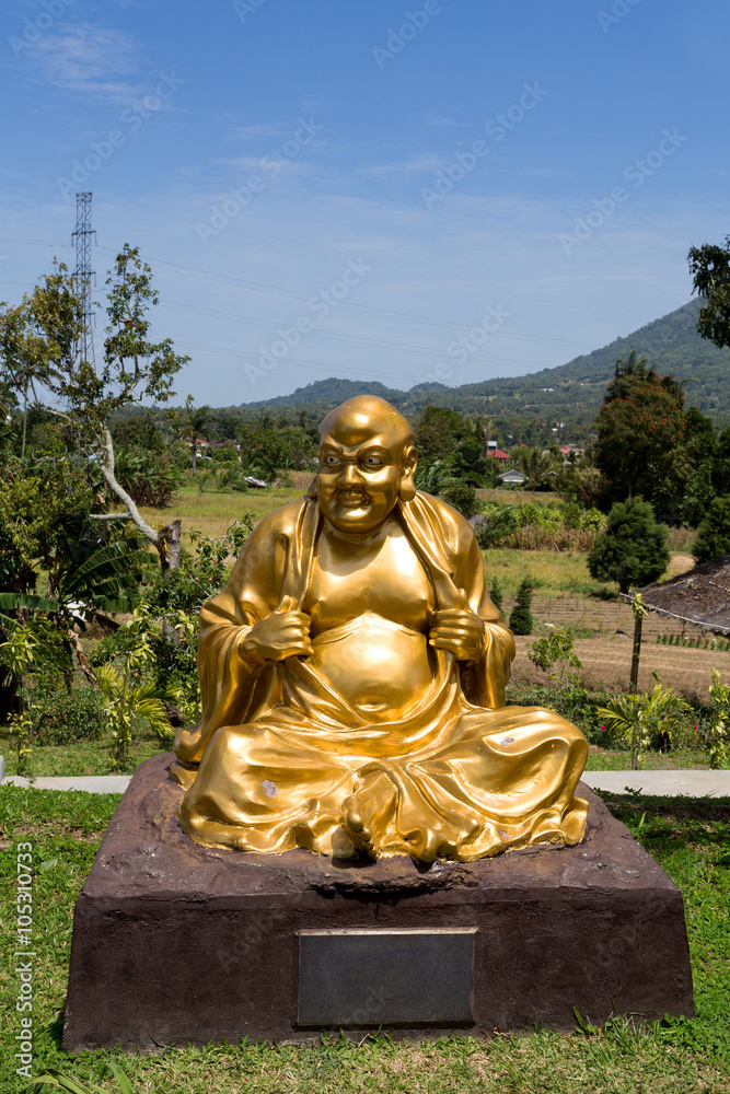 fat monk statue in complex Pagoda Ekayana
