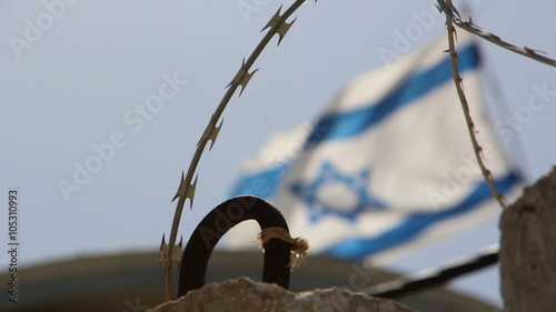 Flag of Israel on the border of Gaza