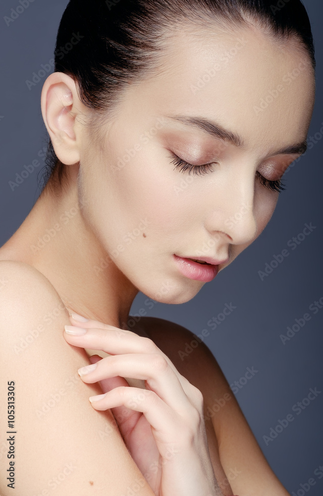 Beauty Portrait. Тender girl. Beautiful Woman Touching her shou Beauty Portrait. Тender girl. Beautiful Woman Touching her shou