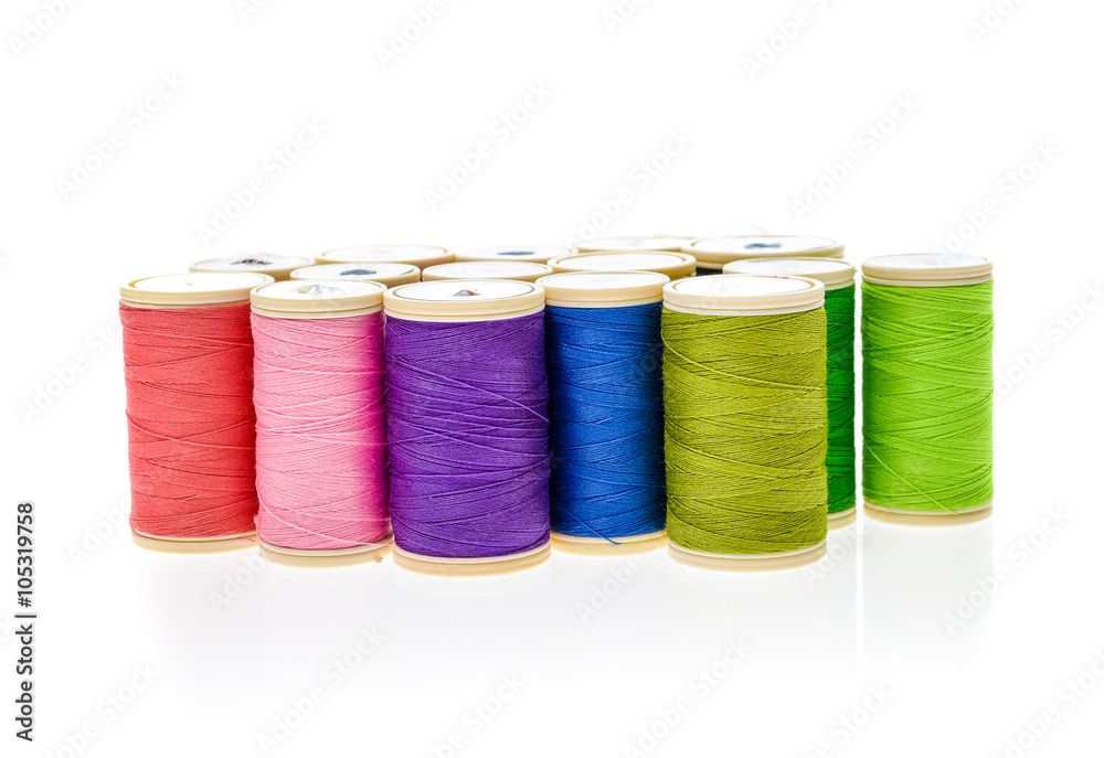 Different color Sewing Threads on a roll. Different color Sewing Threads on a roll.