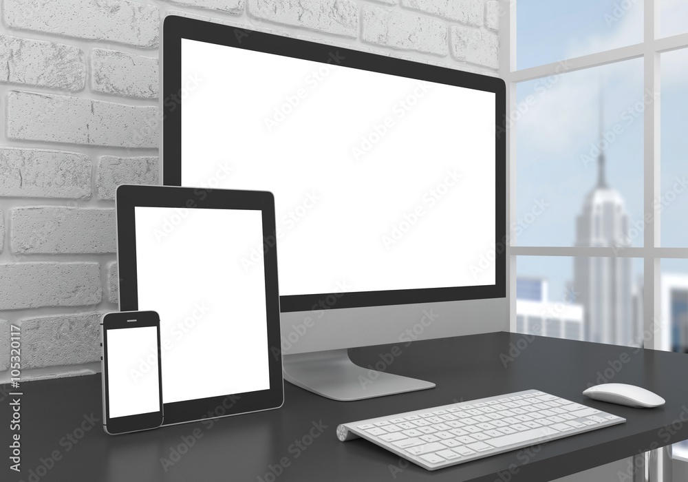 Responsive mockup screen. Monitor, tablet, phone on table in office. Responsive mockup screen. Monitor, tablet, phone on table in office.