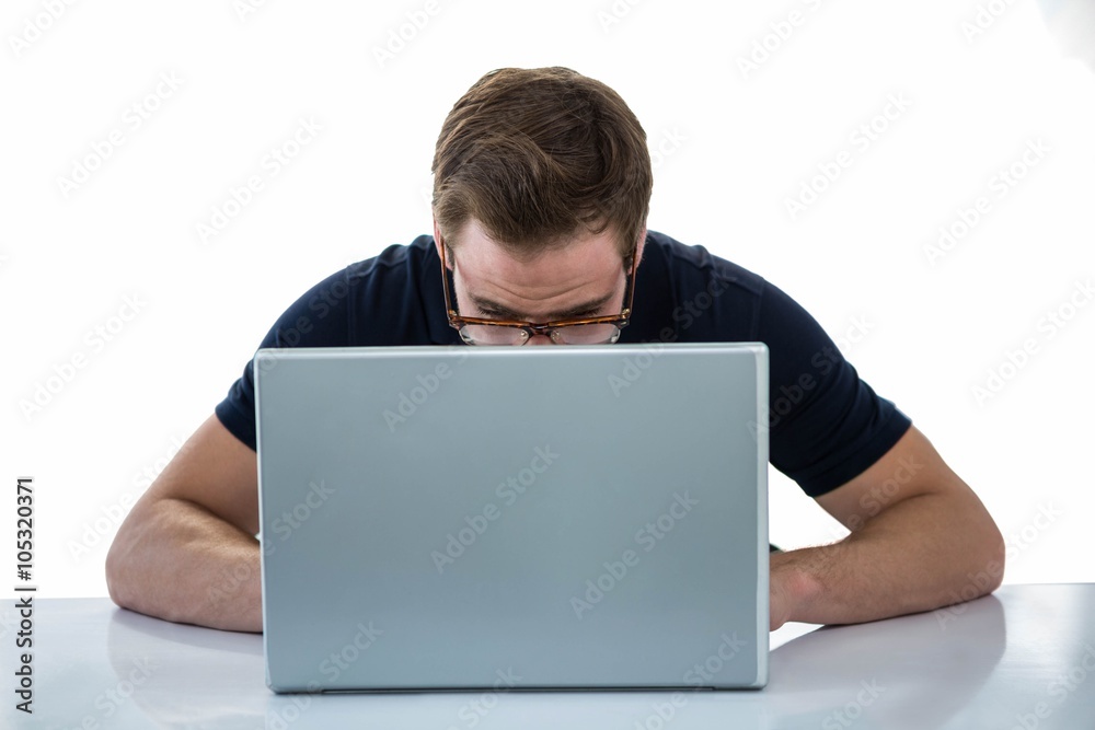 Handsome man with eyeglasses using laptop Handsome man with eyeglasses using laptop