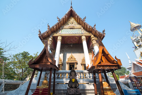 Temple Wat Intharawihan in Bangkok. It was built at beginning of Ayutthaya period, one of the main features is a 32-metre high, 10-metre wide standing Buddha photo