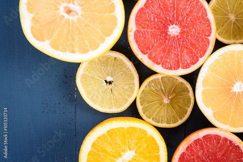 Fototapeta Naklejka Na Ścianę i Meble -  Orange, Grapefruit And Lemon Citrus Fruit Slices