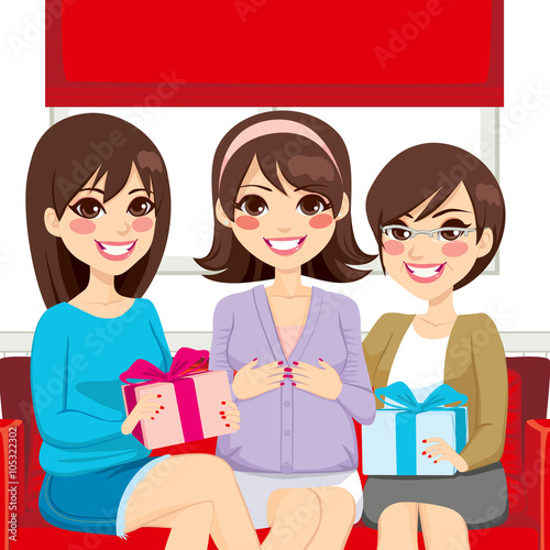 Three beautiful women on a baby shower family party making presents to pregnant woman