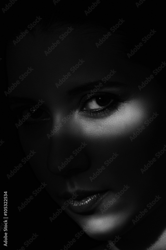 Artistic beauty portrait of young woman with creative lighting Artistic beauty portrait of young woman with creative lighting