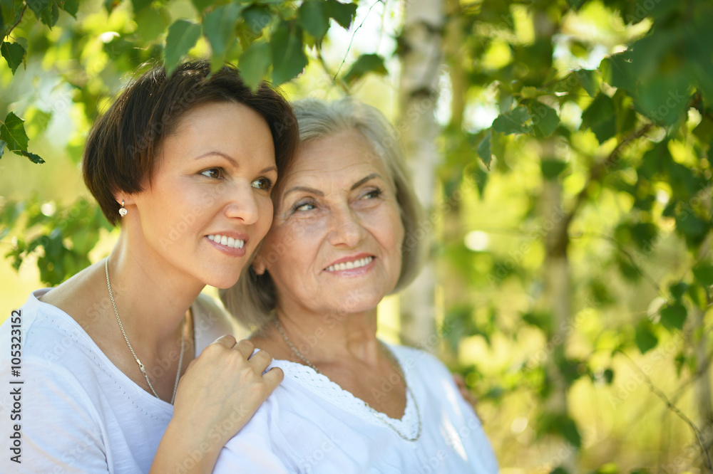 senior Mother and daughter in park senior Mother and daughter in park