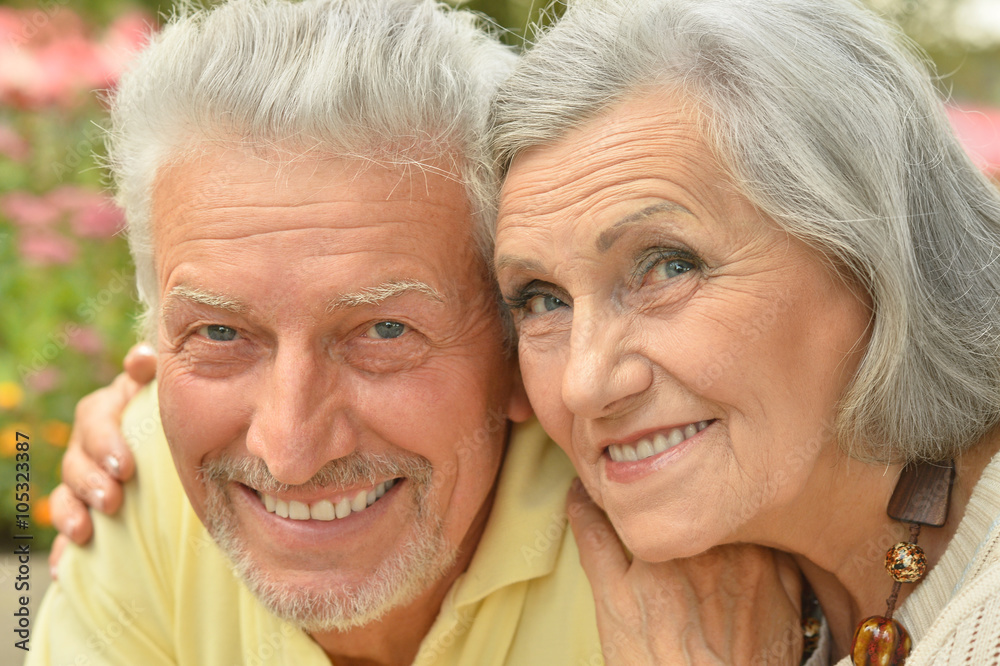 mature couple on in summer park mature couple on in summer park