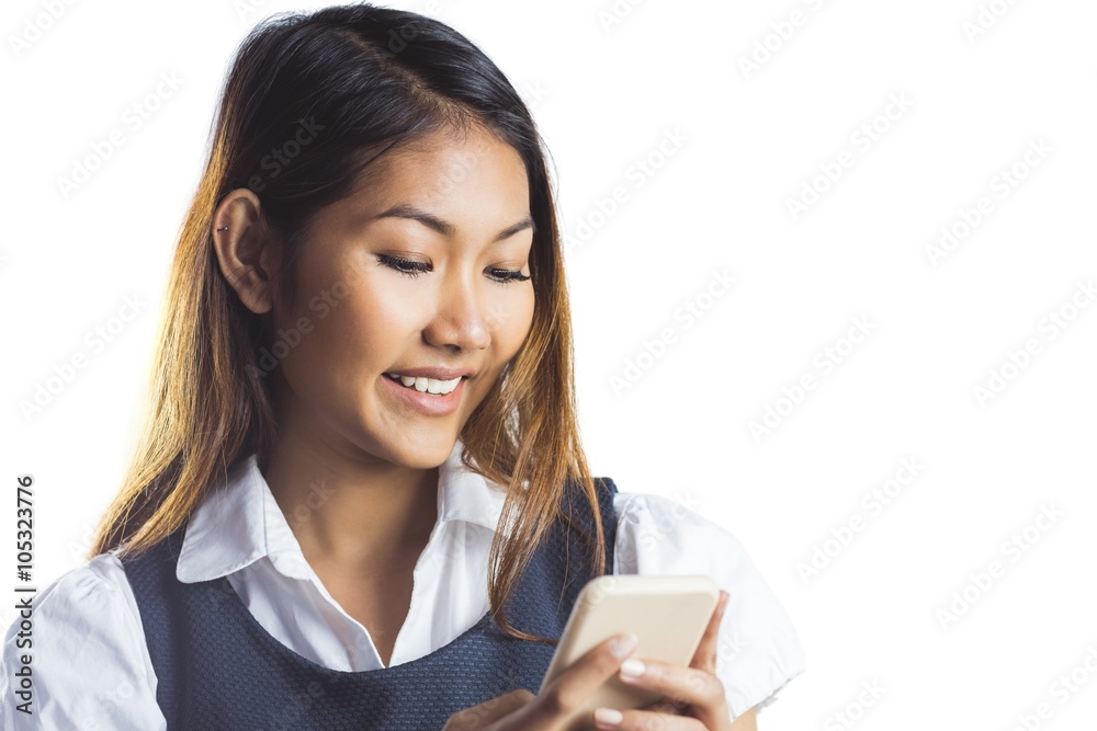Smiling businesswoman using a smartphone Smiling businesswoman using a smartphone
