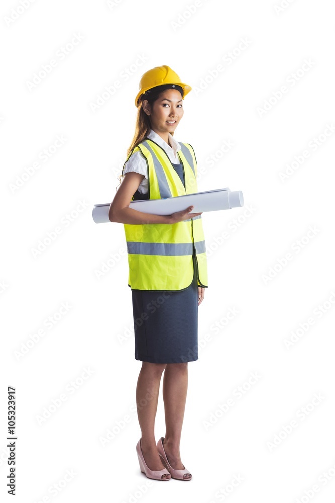 Architect woman with yellow helmet and plans