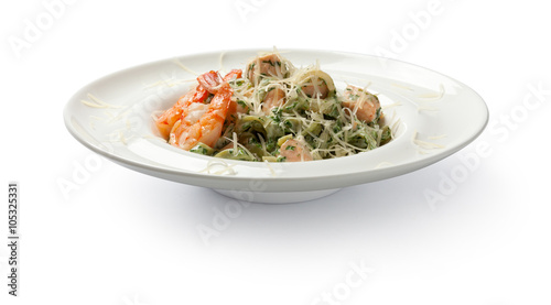 Pasta with shrimps and salmon. Front view.