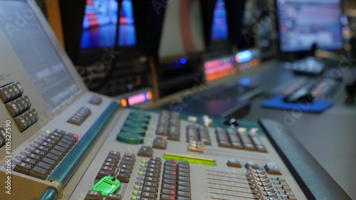 Wallpaper Mural Controls of video and audio mixing console, close up of hands using it, 4K Torontodigital.ca