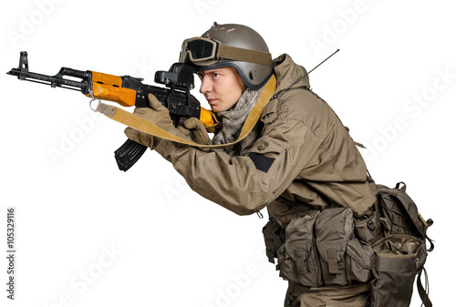 Special forces soldier with rifle on white background