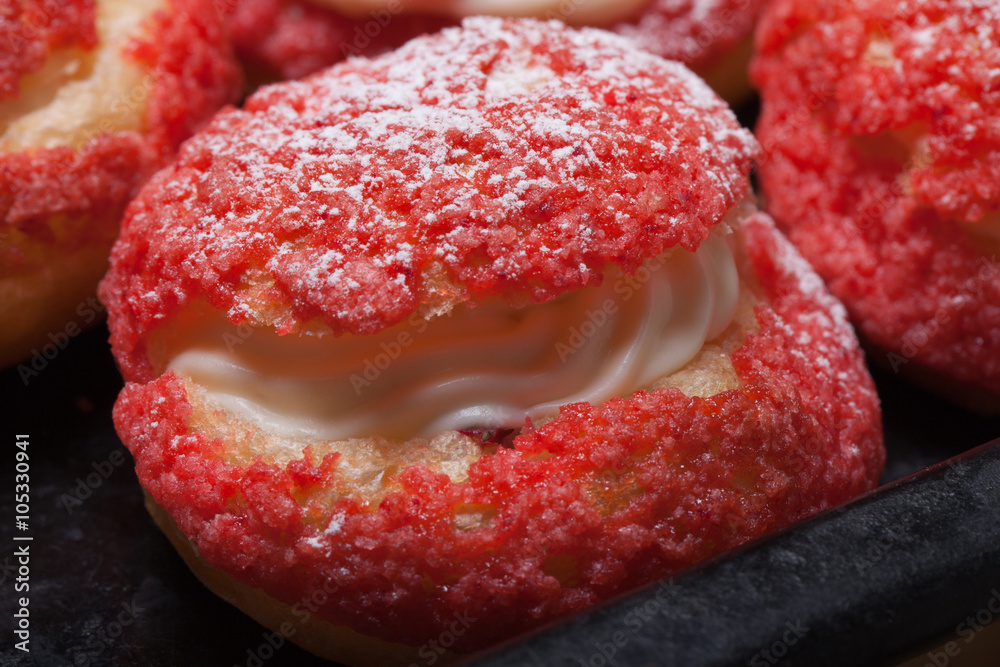 Homemade custard cakes with cream. Shallow depth of field. Selec Homemade custard cakes with cream. Shallow depth of field. Selec