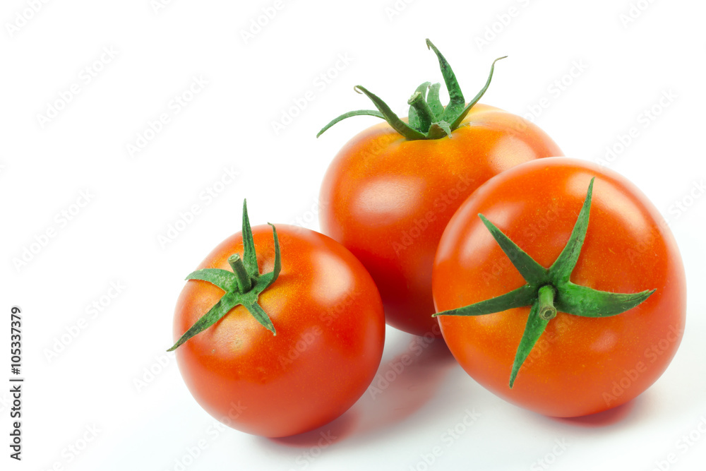 Tomatoes. Whole and a half isolated on white Tomatoes. Whole and a half isolated on white