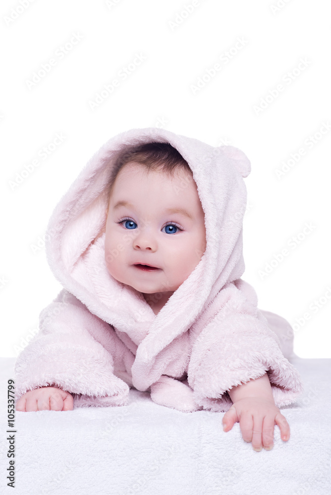 cute baby child in pink bathrobe lying down on blanket cute baby child in pink bathrobe lying down on blanket