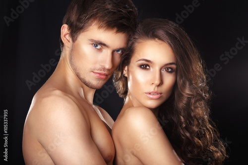 Kissing couple portrait.Sexy beauty couple.Portrait of happy loving couple.Pure passion.Sensual brunette woman in underwear with young lover, passionate couple foreplay closeup