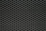 Photo of a natural perforated metal surface