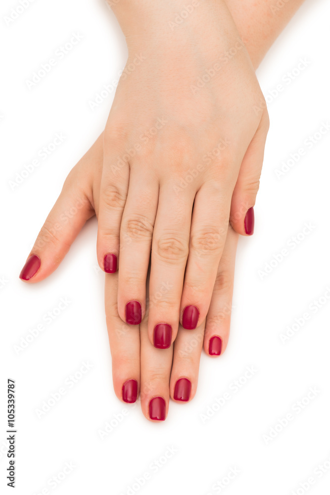 Woman hands with red nail isolated on white Woman hands with red nail isolated on white