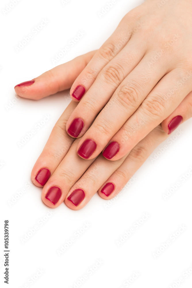 Woman hands with red nail isolated on white Woman hands with red nail isolated on white