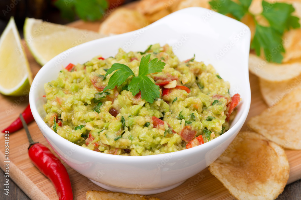snack - Mexican sauce guacamole and chips, close-up snack - Mexican sauce guacamole and chips, close-up