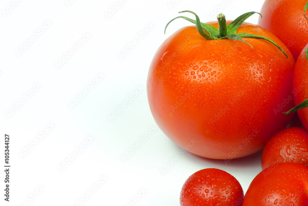 Tomatoes. Whole and a half isolated on white Tomatoes. Whole and a half isolated on white