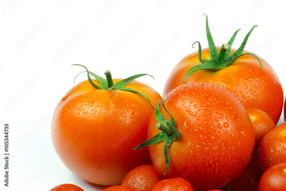 Tomatoes. Whole and a half isolated on white Tomatoes. Whole and a half isolated on white