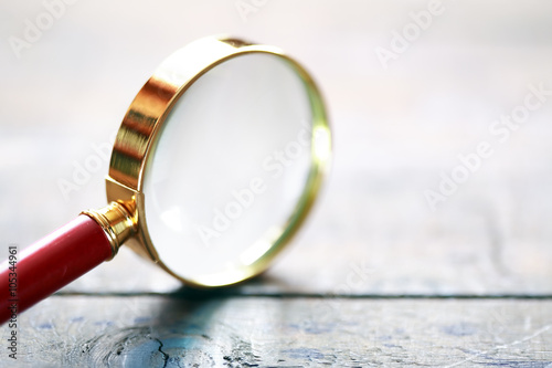 Magnifying Glass On Wood
