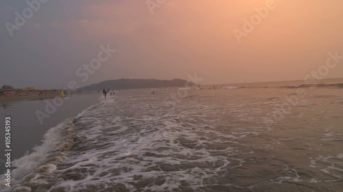 Beautiful sunset at Ashwem beach in Goa photo