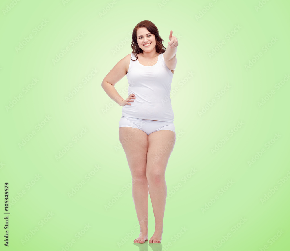 plus size woman in underwear showing thumbs up