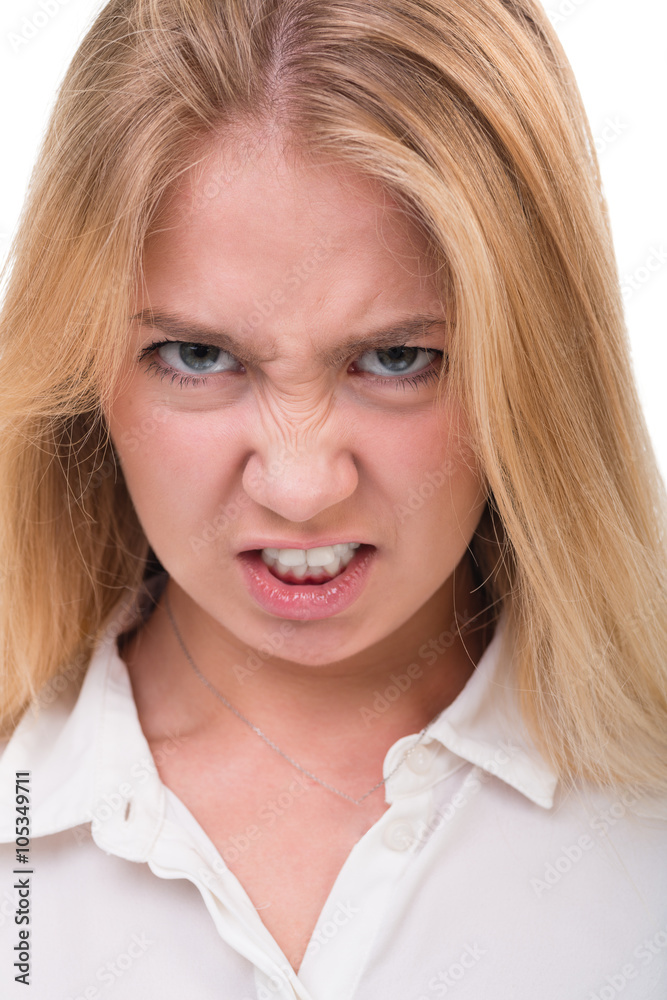 Closeup portrait of sad and angry woman isolated on white