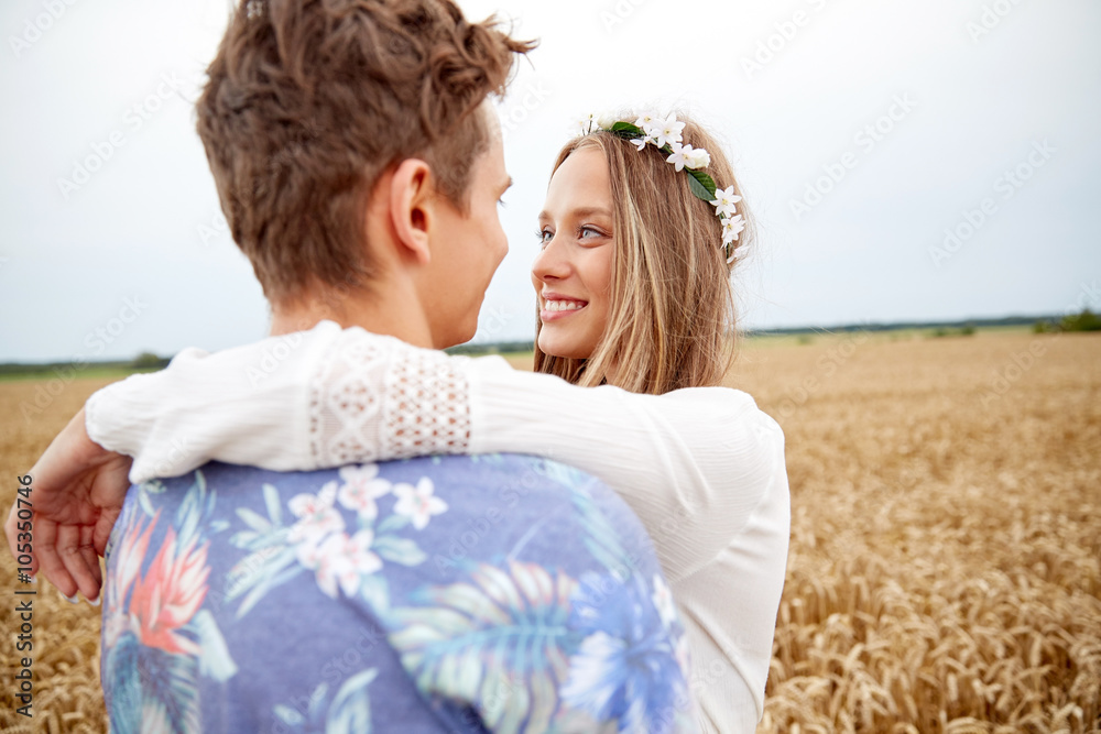 happy smiling young hippie couple outdoors