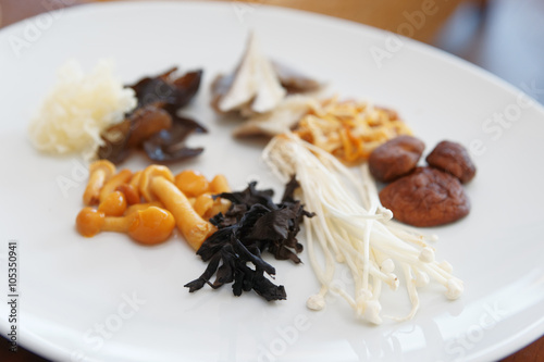 Asian mushrooms on plate photo