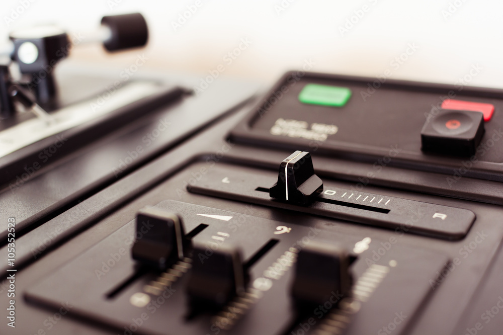 Detail of controls on record player for LP vinyl discs Detail of controls on record player for LP vinyl discs