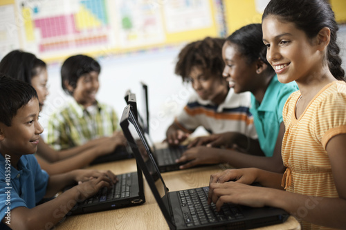 A group of students using laptops in a lesson, 
