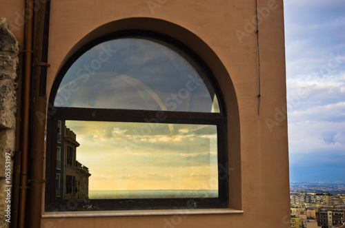 Reflection of a sunset in Cagliari downtown  Sardinia  Italy